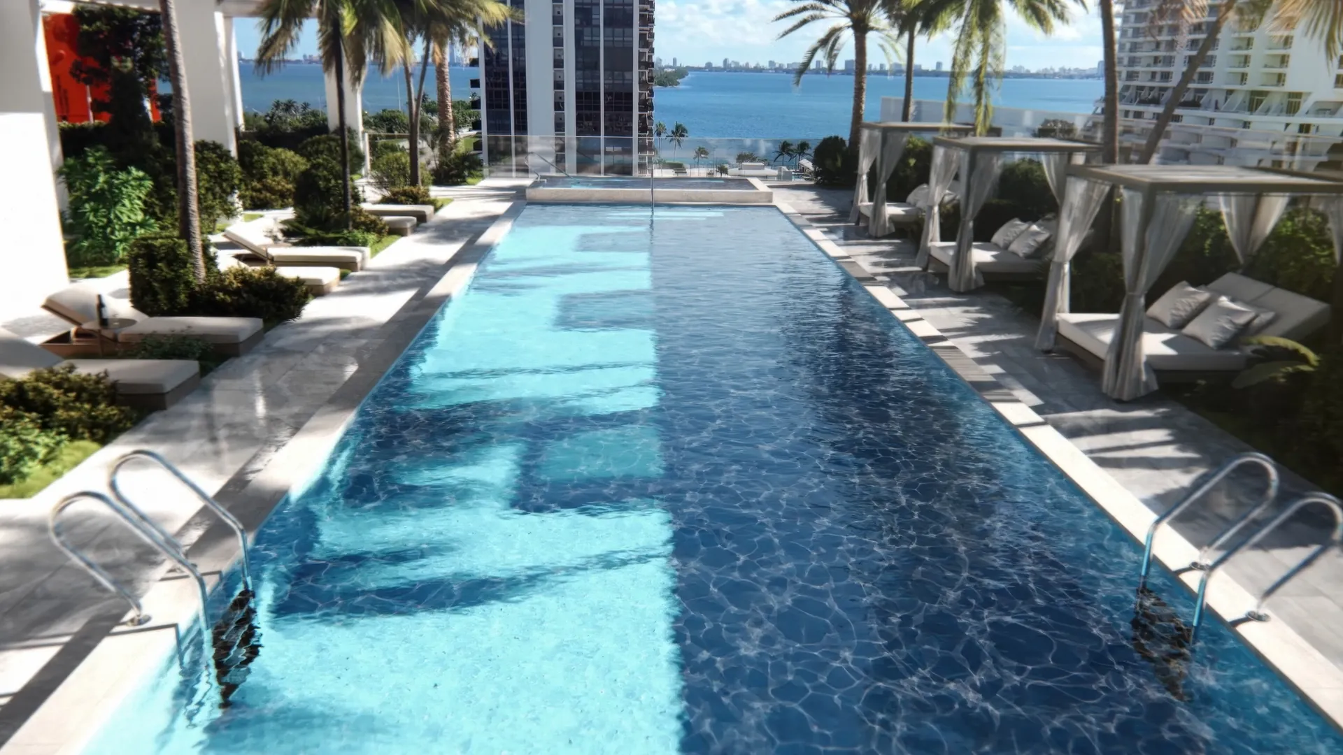 The VIDA rooftop pool deck at dusk overlooking the Miami skyline