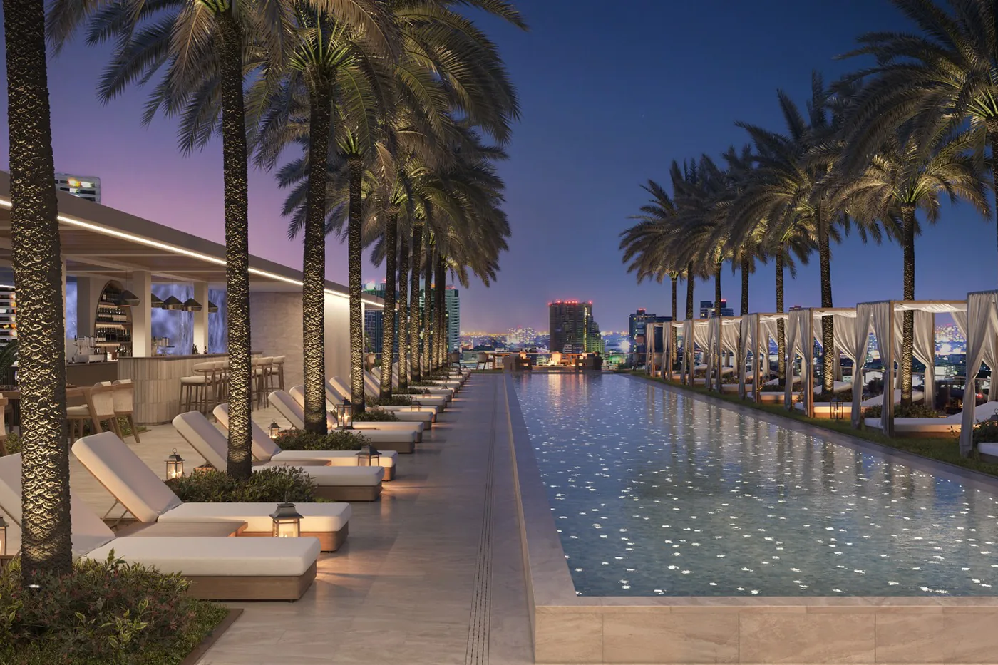 Evening view of the VIDA rooftop lounge with the Edgewater skyline